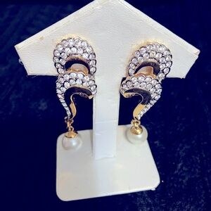 Gold Swarovski crystal and pearl drop earrings.